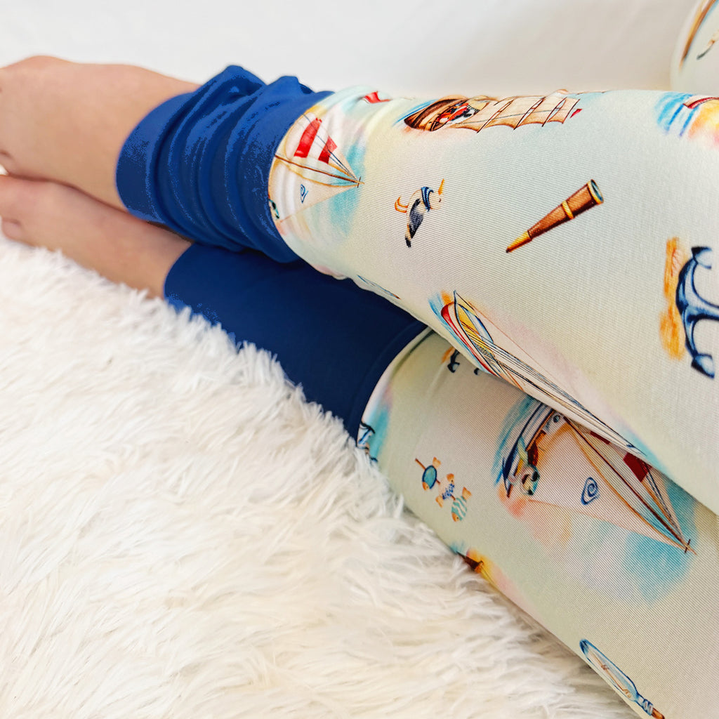 Kai Blue 2 Piece PJs Foot Cuffs Close-up with Sailing Print