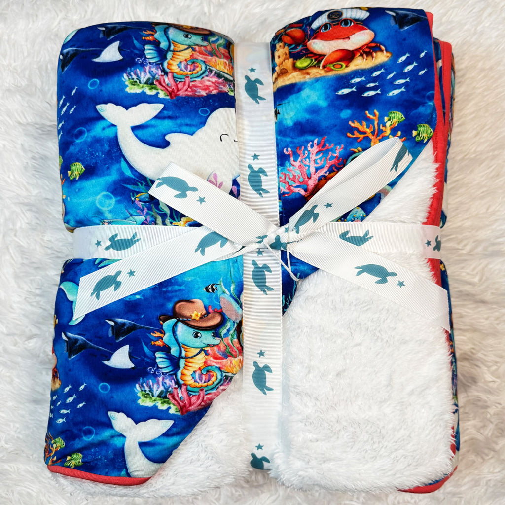 Bamboo Blanket with white plush backing in underwater sea print - back-view - Kai Blue