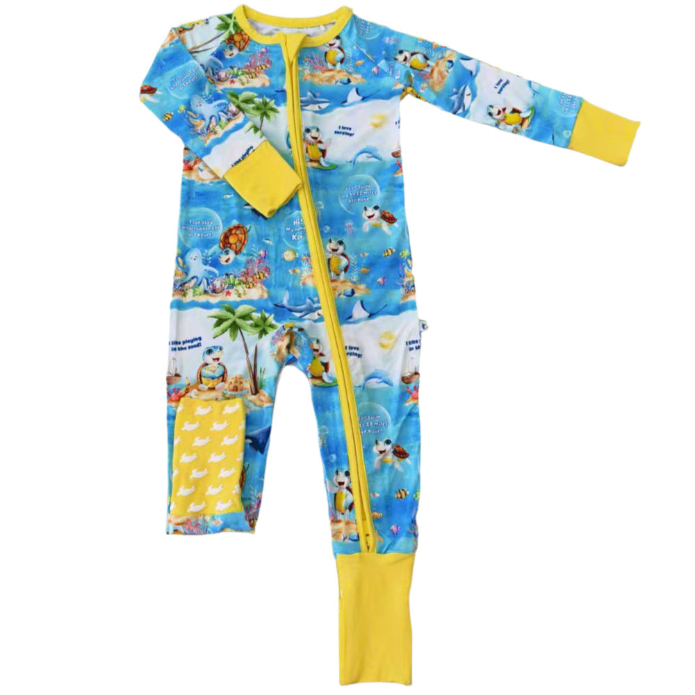 Flat layout of bamboo zippy from Kai Blue with Meet Kai print