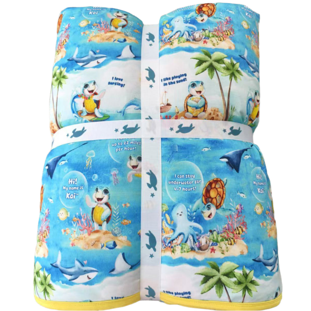 Front of the Meet Kai the Sea Turtle Quilted Bamboo Blanket