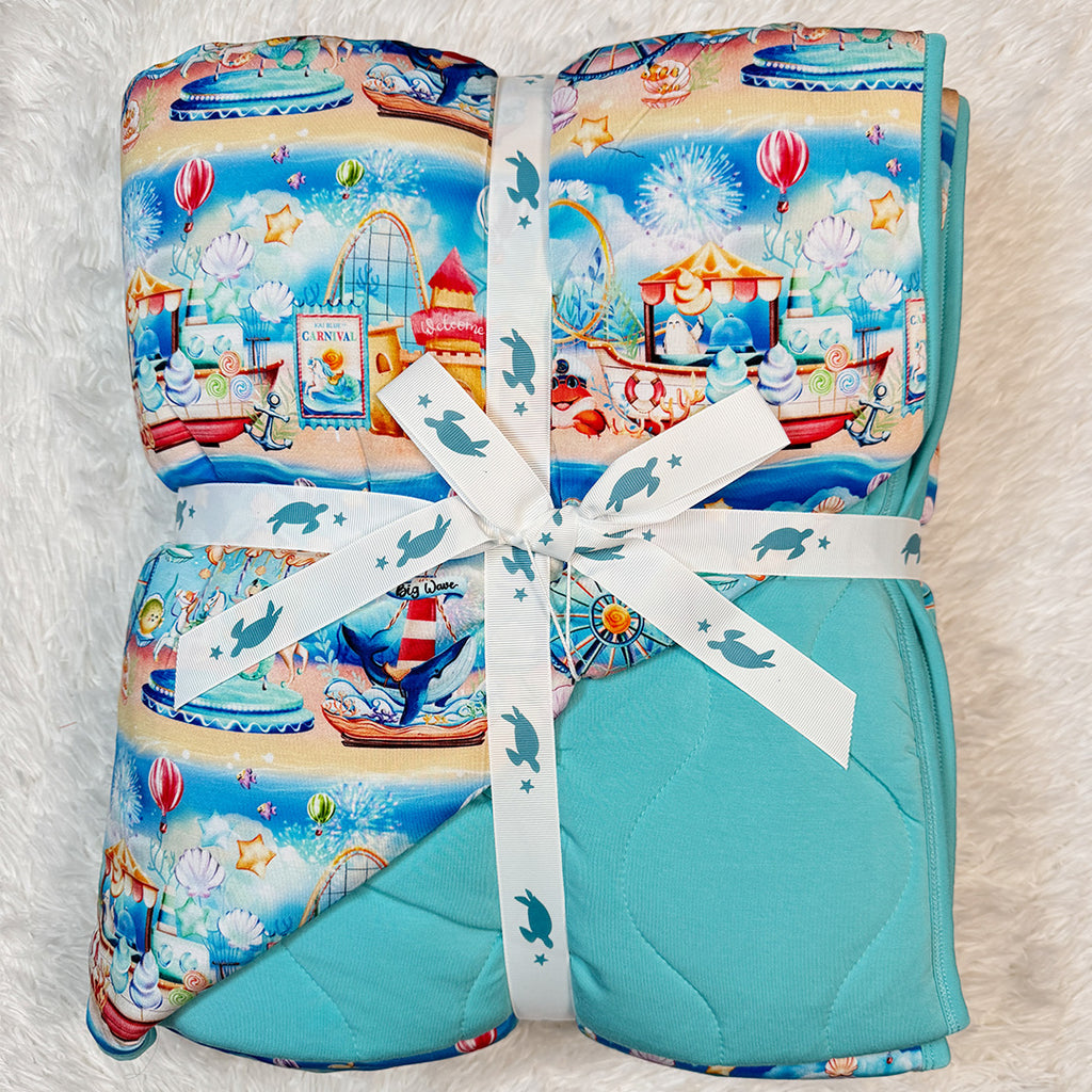 Quilted underwater carnival bamboo blanket back
